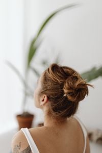 Kaboompics - Side View of a High Bun Secured with a Pencil