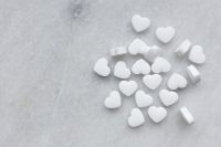 Kaboompics - White Candy Hearts on Soft Neutral Background