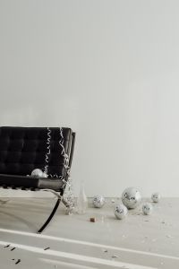 Kaboompics - Cropped Black Chair with Disco Balls and Open Copy Space