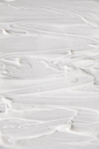 Kaboompics - Smooth White Cream Texture Close-Up on Minimal Background