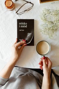 Kaboompics - Woman read book and drink coffee
