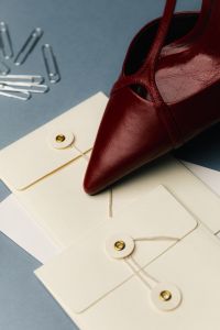 Kaboompics - Red Heels And Retro Phone On Office Desk Aesthetic Flat Lay