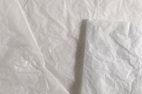 Folded White Paper with Raised Strip