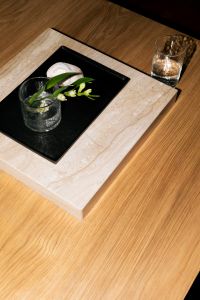 Kaboompics - Minimal Still Life With Stone Tray Glass And Flower Arrangement