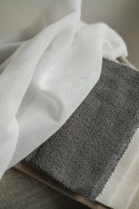 Kaboompics - Sheer White Textile and Gray Fabric Sample