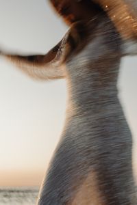 Kaboompics - Motion Blur Sequin Dress at the Beach at Sunset