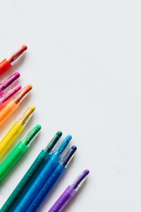 Crayons Framing Open White Space, Minimal Rainbow Layout for Classroom and Craft Design