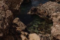 Kaboompics - Deep Green Water in a Narrow Rocky Cove