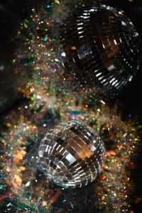 Kaboompics - Disco Balls on Sparkling Tinsel with Colorful Bokeh