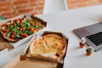 Kaboompics - A workplace full of pizza