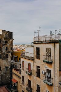 Kaboompics - Weathered Tenement Facades and Rooftop Antennas in Naples