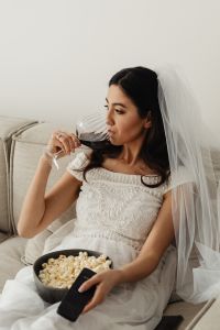Kaboompics - Bride Taking a Wine Break in an Embellished Wedding Gown