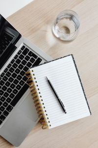 Kaboompics - Top View of Laptop, Notebook, Pen and Glass of Water