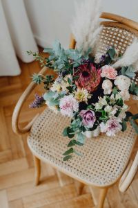 Kaboompics - Top-Down Flower Arrangement on Woven Rattan Chair