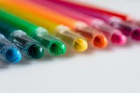 Kaboompics - Colorful Crayon Tips in Soft Focus on White, Rainbow Art Supplies for School Projects