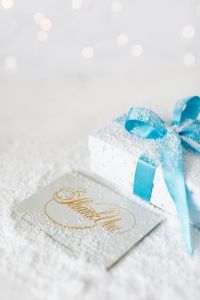 Kaboompics - Blue-Ribbon Present and Thank You Card with Soft Bokeh Copy Space