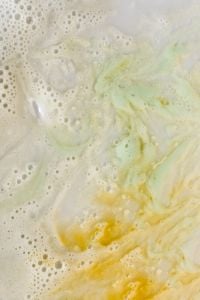 Kaboompics - Pale Yellow Skincare Foam Texture with Fine Bubbles, Macro Background