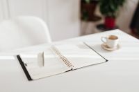 Kaboompics - Bright Desk with Open Planner, Pen and Coffee Cup, Minimal Home Office