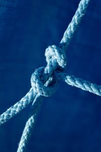 Kaboompics - Close Up of Nautical Rope Knot on Blue Background