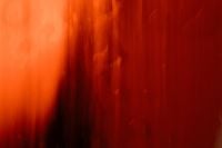 Kaboompics - Red Orange Wet Glass Abstract Background