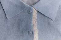 Kaboompics - Blue Knitted Garment With Collar and Delicate Trim