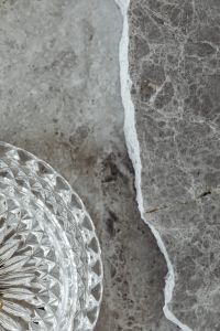 Kaboompics - Vertical Gray Marble Texture with Crystal Dish Cropped at Lower Left