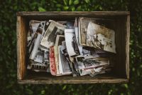 Kaboompics - Open Wooden Box Filled With Vintage Photographs