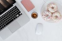 Kaboompics - Macbook Laptop, donuts & coffee