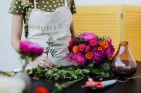Kaboompics - Florist Arranging Flowers at a Worktable