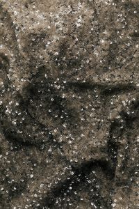 Kaboompics - Silver Sequin Fabric with Textured Folds