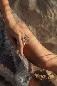 Kaboompics - Statement Rings and Bare Legs in Summer Dunes