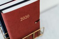 Kaboompics - 2020 Planner Cover Close-Up on Marble with Copy Space