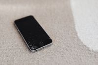 Kaboompics - Broken Mobile on Fabric