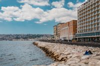 Kaboompics - Naples Breakwater and Waterfront Hotels Under Blue Sky