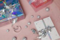 Kaboompics - Pastel Gift Boxes and Silver Baubles Flat Lay