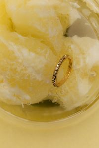 Kaboompics - Elegant Golden Ring on Frozen Lemon Slice