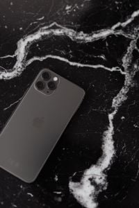 Kaboompics - Angled Apple iPhone 11 Pro on Black Marble