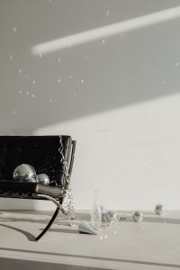 Kaboompics - Wide New Year's Eve Interior with Black Lounge Chair and Disco Ball Decor