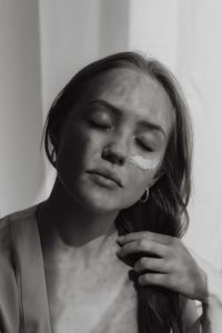 Kaboompics - Black and White Portrait with Eye Cream Applied Beneath One Eye