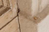 Kaboompics - Gold and Silver Rings on a Textured Stone Ledge, Wide Minimalist Jewelry Background