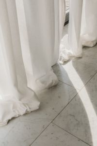 Kaboompics - Sheer White Curtains and Sunlit Marble Floor