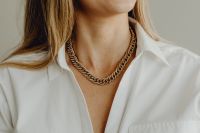 Kaboompics - Gold Chain Necklace on Woman in White Shirt