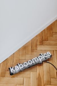 Kaboompics - Neon Kaboompics on wooden parquet flooring
