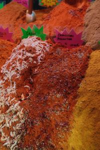 Kaboompics - Colorful Paprika and Spice Piles at an Open-Air Market
