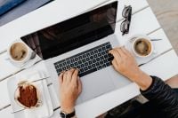 Kaboompics - Laptop and Espresso at an Outdoor Cafe by the Sea