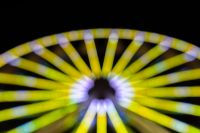 Kaboompics - Yellow Ferris Wheel Spokes with a Soft Violet Center