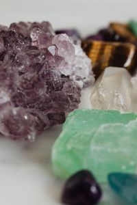 Kaboompics - Portrait Macro of Amethyst Cluster and Quartz Points with Tiger's Eye in Background