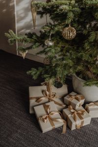 Kaboompics - Christmas Tree with Wrapped Gifts and Gold Woven Ornament