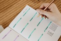 Kaboompics - Weekly Bullet Journal Layout With Gold Pen