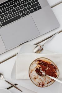 Kaboompics - Overhead Laptop and Partly Eaten Tiramisu